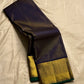 Krishna Shyama — Pure Silk Kanchipuram

Deepest purple “Shyama” body with Vairaoosi pinstripes

Temple-inspired antique gold zari borders with green selvedge

Grand striped zari pallu with hand-tied tassels

Silk Mark Certified • free shipping