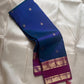 Purple Allure – Pure Kanchipuram Silk Saree
Peacock-blue body adorned with petite zari floral buttas 🌸
Contrast royal-purple border with grand elephant procession 🐘
Rich zari brocade pallu in floral motifs ✨

Silk Mark Certified, delivery in 2 weeks