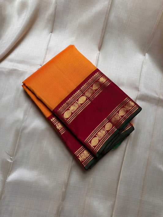 Vasantha Malli ✨ — Pure Silk Kanchipuram
Sunset-orange body with fine textured weave 🌸
Deep maroon borders with kasu zari & temple motifs ✨
Grand brocade pallu with traditional circular jaal 🪔 Perfect for Diwali & festive drapes
Silk Mark Certified • Fr