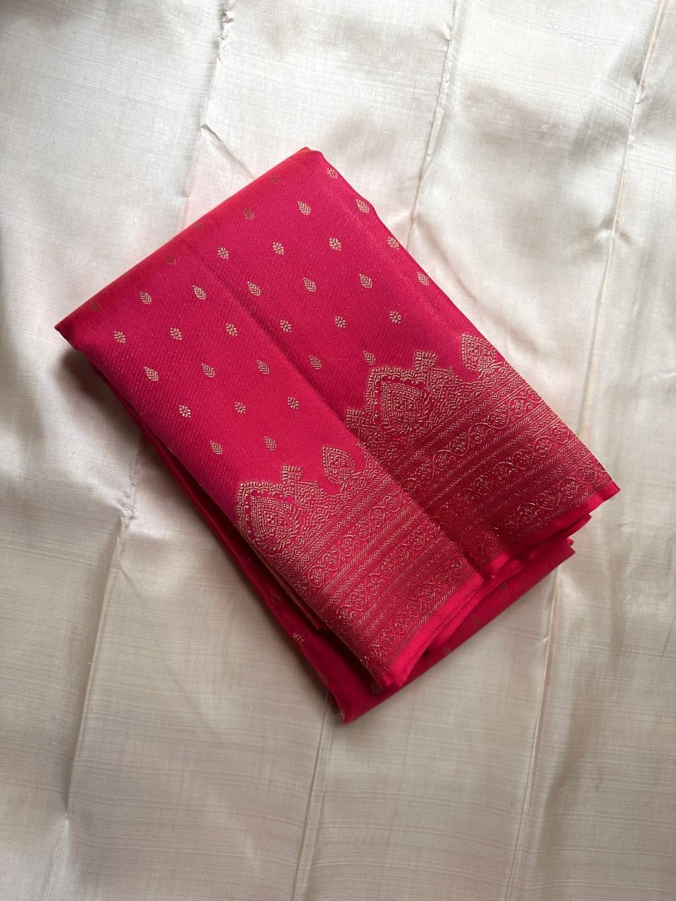 Kemp Kanchi Collection – Rosy Coral Pink
Pure Kanchipuram Silk with Gold Leaf Buttas & Temple Zari Borders
Silk Mark Certified • Free Shipping within USA • Ships in Two Weeks