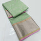 Anaya – Earthy Green Silk Chanderi Saree with Pink Contrast Border & Full Zari Pallu
A refreshing earthy green Silk Chanderi saree that drapes like a dream.
Adorned with fine gold and silver zari work across the body.
