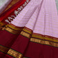 Pastel Pink Zari Kattam
Blush-pink  Kanchipuram Silk Saree
Contrast Maroon Borders in Gold Zari