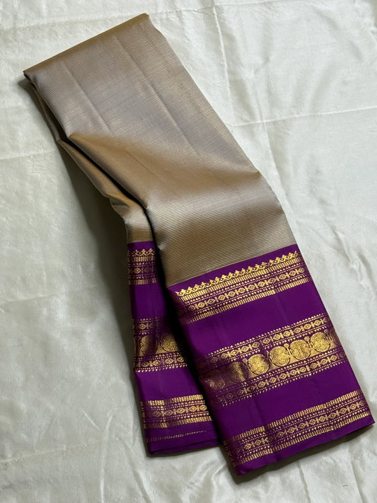 Orchid Vairaoosi ✨ – Pure Kanchipuram Silk Saree with Unique Mupettu Border


Regal Purple Vairaoosi Body with Fine Zari Pinstripes

Silver-Grey Rettapet Contrast with Unique Orchid Purple Mupettu Border