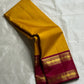 Swarna Manjal vairaoosi 
Pure Silk Kanchipuram Saree – Radiant Mustard Yellow Body with Maroon Border & Grand Brocade Pallu
Silk Mark Certified ✅
Fall & Pico Done ✅ | Blouse Stitching Available ($30) ✅
Free Shipping within the USA ✅ | Ships in Two Weeks ✅