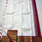 Shveta Chakram — Ivory Kanchipuram Pure Silk 🤍

Contrast maroon brocade pallu & temple border ✨

Chakra medallions, floral vines + green selvedge 🌿

Orange pin-stripes on the border; tasselled finish 🪔

Silk Mark Certified • free shipping with Usa with