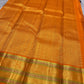 Jamun Purple Kesar – Korvai Kanchipuram Pure Silk Saree

Regal jamun-purple body adorned with antique-gold floral buttas

Kesari-orange korvai border with chakra roundels, vines & chevron zari

Free shipping withinUSA silk mark certified ships in 2 weeks