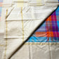 Venpattu Kattam Thazampoo Reku – ivory/venpattu borders with multicolor kattam (checks) body

Pure Kanchipuram silk • rani pink, tangerine, purple, sky blue & steel grey checks with thazampoo reku edging

Ivory pallu with gold tissue stripes & multicolor