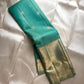 Minted Teal Glow Vaira-oosi

Pastel Teal Body with Silver “Chakram” Buttas

Antique-Gold Zari Paisley Border & Rich Woven Pallu

Silk Mark Certified ✅ Free Shipping within USA ✅

Ships in Two Weeks ✅ Blouse Stitching Available ✅