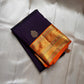 Jamun Purple Kesar – Korvai Kanchipuram Pure Silk Saree

Regal jamun-purple body adorned with antique-gold floral buttas

Kesari-orange korvai border with chakra roundels, vines & chevron zari

Free shipping withinUSA silk mark certified ships in 2 weeks
