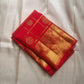 Ambaram – Sindhuram - Silk mark certified Kanchipuram silk

Elephant Procession Zari Border • Coin & Gandaberunda Buttas

Copper-Orange Brocade Pallu with Diamond-Jaal

Handloom • Running Red Blouse with Zari Border

Silk Mark Certified • Ships in Two Wee