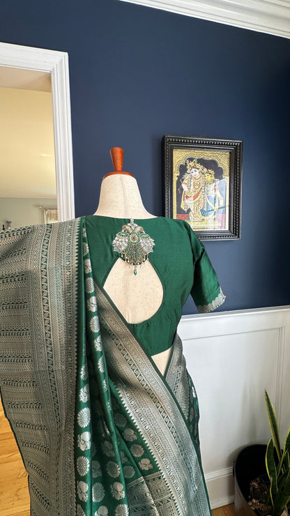 Green silver and gold Saree with peacock motif embroidery embellished with temple jewelry style stone work