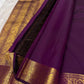Traditional Kanchipuram silk saree in jewel-toned orchid purple with heritage Annapakshi weaving