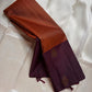 Rust Orange & Wide Broad Silk Korvai – Pure Kanchipuram Silk Saree

Deep wine body adorned with gold ambi buttas for subtle elegance

Contrast rust-orange wide korvai border with podi-kattam micro checks

Grand wine pallu with full-zari diamond jaal