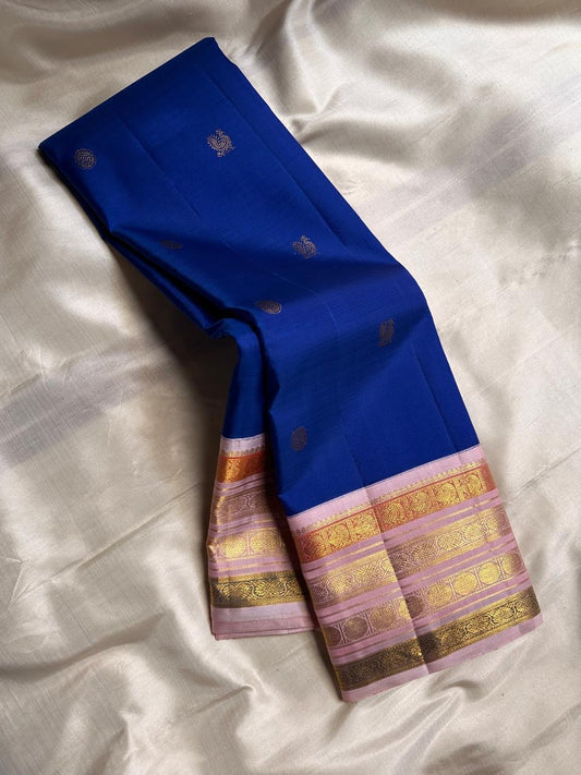 Vibrant royal deep blue with pastel pink varisaipet border and Pallu pure silk Kanchipuram saree