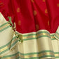 Yazhi Venpattu — Pure Silk Kanchipuram
Kumkum-red body with gold mankolam buttas & ivory korvai borders in mint-green lines ✨
Silk Mark Certified • Ships in Two Weeks • Free Shipping within USA