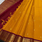 Saffron Royale – Pure Kanchipuram Silk Saree with Peacock Motif Border
Majestic saffron body with delicate zari buttas.
Rich maroon border woven with grand peacock motifs in  zari.
Traditional maroon pallu. Silk Mark Certified, delivery in 2 weeks