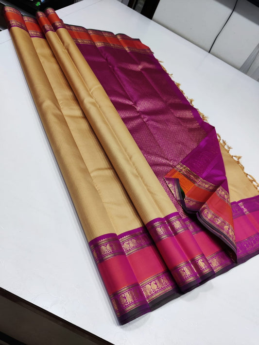 Gold Rose – Pure Kanchipuram Silk Saree
Golden Body with Subtle Self-Texture ✨
Rani-Pink Rettapet Border with Gold Zari
Grand Rani-Pink Brocade Pallu with Traditional Motifs

Silk Mark Certified, delivery in 2 weeks