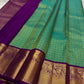 Sindhu- Teal & Purple Kanchipuram Pure Silk Saree with Floral Jaal & Mayil Border
A rich teal base adorned with delicate floral jaal and regal purple mayil borders creates timeless elegance. The diamond-motif pallu adds a bold, sophisticated finish to th