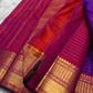 Amethyst Zari Kattam – Pure Kanchipuram Silk Saree
Rich Amethyst Purple Body with Golden Zari Checks
Broad Gold Zari Border with Red Highlights & Temple Motifs
Radiant Ruby Red-Orange Pallu with Lustrous Zari Stripes

Silk Mark Certified, delivery in 2 we