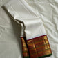 Shveta Chakram — Ivory Kanchipuram Pure Silk 🤍

Contrast maroon brocade pallu & temple border ✨

Chakra medallions, floral vines + green selvedge 🌿

Orange pin-stripes on the border; tasselled finish 🪔

Silk Mark Certified • free shipping with Usa with