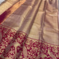 Champagne beige and crimson Kanjivaram silk saree with antique-gold zari