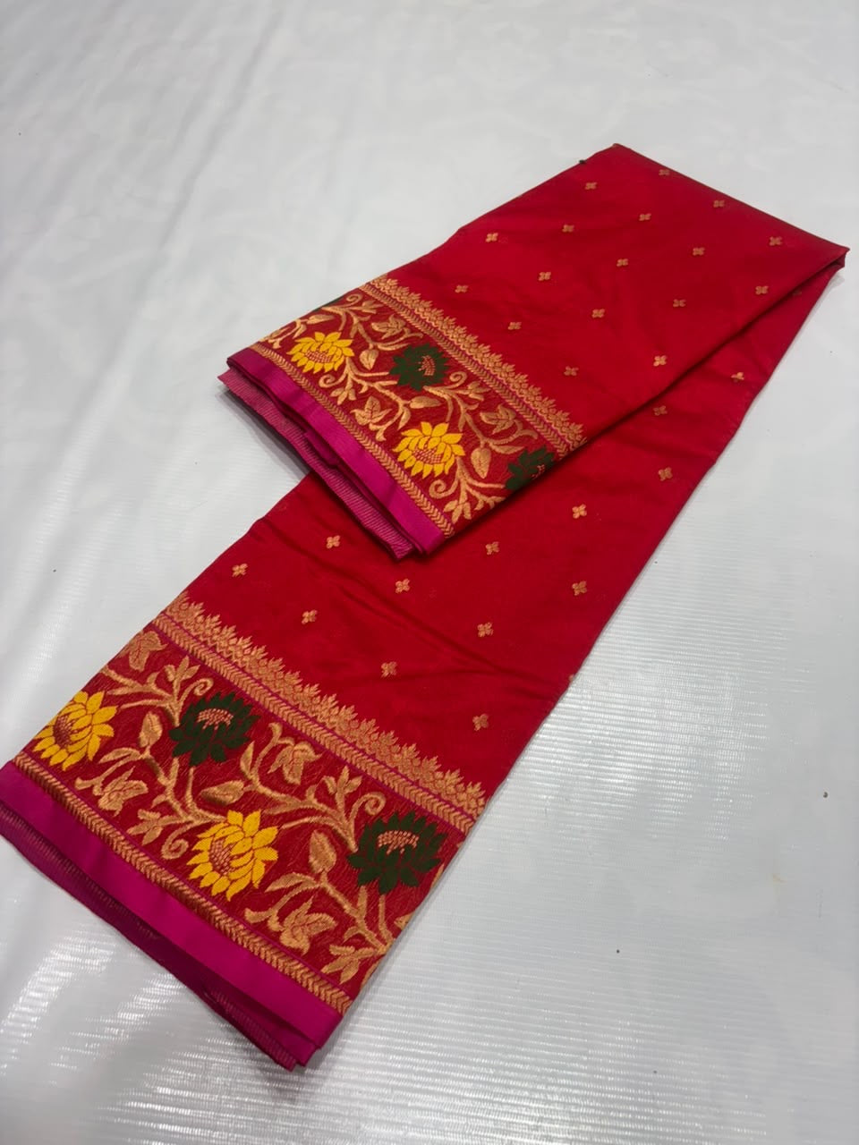 Vermilion Red Pattu Silk Chanderi saree with gold vine floral border and Rani Pink edge detailing