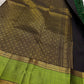 Pachai Maragatham — Pure Kanchipuram Silk Saree
Deep pachai (forest green) body with gold chakram buttas and maragatham chevron zari borders, finished with a coffee-brown brocade pallu.
Silk Mark Certified • Blouse Stitching Available ($30) • Free Shippin