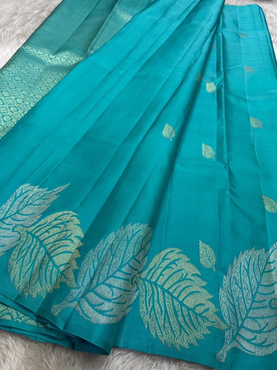 Blue - Pure silk Kanchipuram handloom saree with contemporary gold and silver Zari leaf motifs on border and Pallu