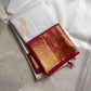 Ivory Mayil – White Mayil Butta Korvai Kanchipuram Silk Saree
Pure handloom silk | Ivory body with gold peacock buttas
Wine-maroon korvai border with peacock & floral zari motifs
Grand gold-zari brocade pallu | ships in two weeks
Silk Mark Certi