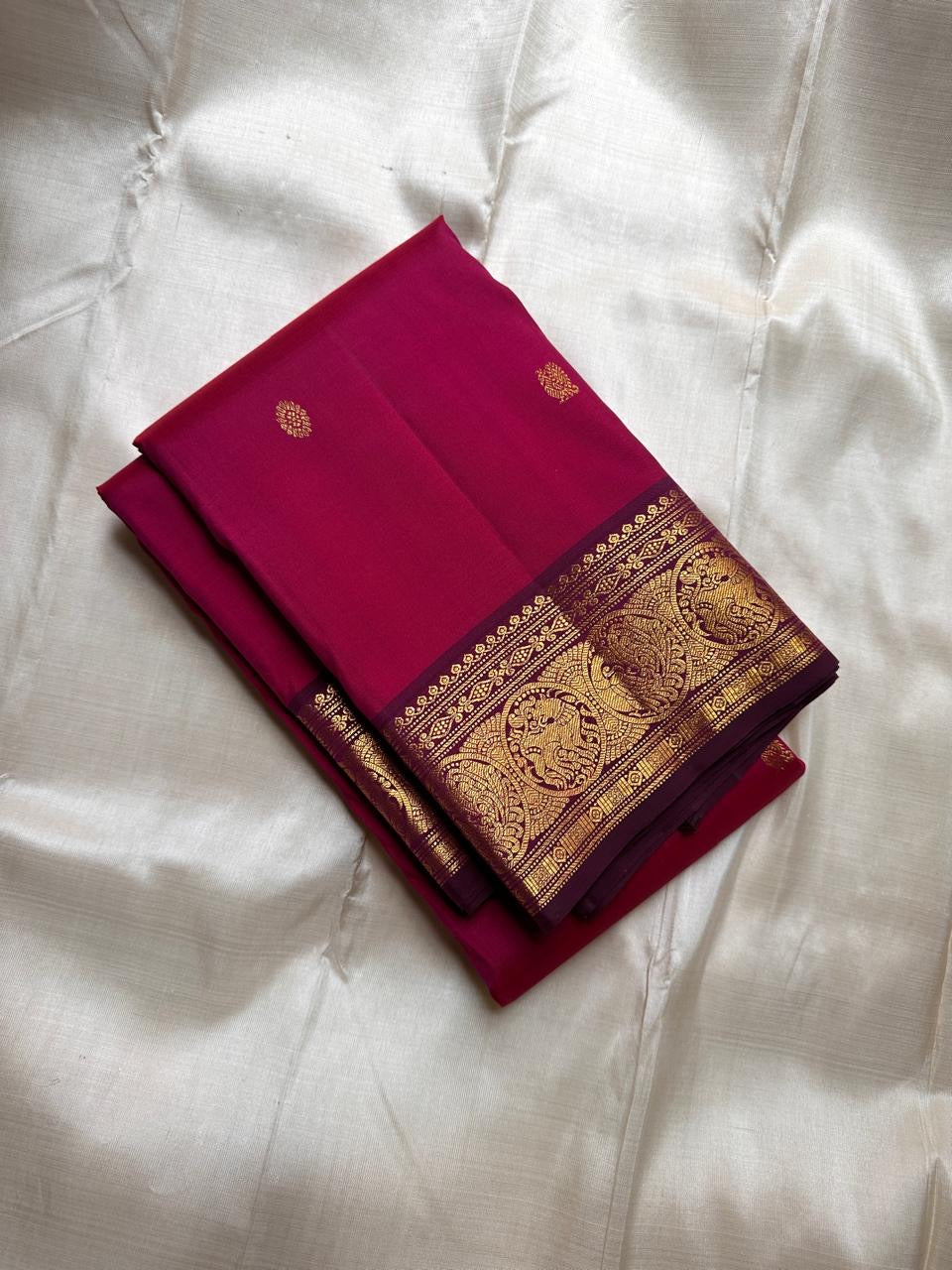 Raaga Raspberry Pink
Raspberry-Pink Kanchipuram Silk Saree
Zari-Woven Medallion Border & Grand Pallu