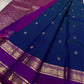 Royal blue Kanchipuram silk saree spread with purple zari pallu and gold border detailing