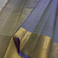 Dia ✨ – Unique Ash Lilac Grey Kanchipuram Pure Silk Saree
Gold Zari Buttas Adorning the Body
Intricate Gaja–Annam (Elephant & Peacock) Motif Border
Coordinated Ash Lilac Grey Silk Blouse Piece Included
Silk Mark Certified | Fall & Pico Done
