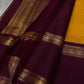 Bhanu – Mustard Gold Handwoven Kanchipuram Silk Saree with Deep Coffee Brown Borders, Intricate Elephant Motif Zari, and a Grand Temple-Inspired Pallu