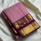 Rose Mist Zari Kattam — Kanchipuram Pure Silk

Blush rose-pink body with micro kattam (checks) in zari & scattered soorya-chakram buttas

Contrast mulberry purple korvai borders with rich gold zari detailing

Free shipping within USA silk mark certified