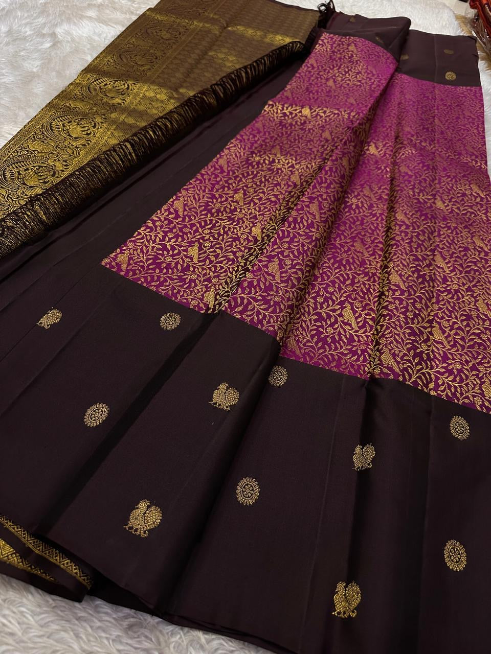 Kavithanjali Plum – Pure Kanchipuram Silk Saree
Plum Body with Gold Floral Zari Buttas & Rich Meenakari Border
Silk Mark Certified • Free Shipping within USA • Ships in Two Weeks