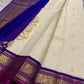 ⸻

Ivory Glow ✨ – Pure Kanchipuram Silk Saree in Ivory

Korvai Royal-Purple Border with Elephant & Peacock Zari Panels; Magenta Selvedge
Body with Gold Coin & Paisley Buttas
Grand Royal-Purple Brocade Zari Pallu with Hand-knotted Tassels
