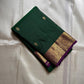 Marakatha Valli ✨ – Pure Kanchipuram Silk Saree
Emerald Green Body with Fine Zari Buttas
Royal Purple Korvai Border with Gold Zari Motifs
Majestic Purple Pallu with Rich Gold Zari Brocade
Silk Mark Certified | Fall & Pico Done | Blouse Stitching ($30) |