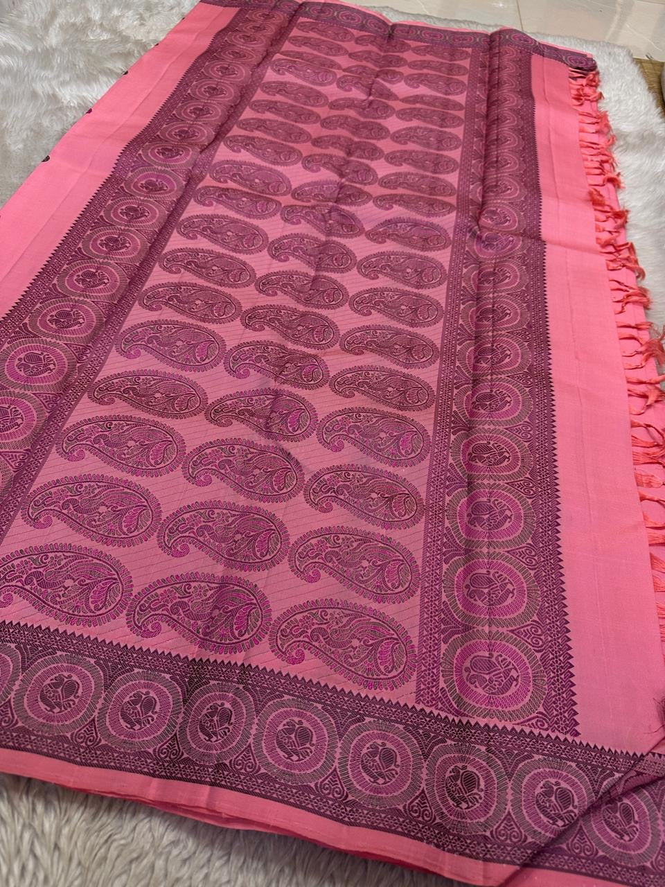 Rose Thread Work Butta — Pure Kanchipuram Silk
All-thread weave in rose pink with magenta & olive buttas, zari-free elegance
Plum-purple parrot medallion border • Paisley pallu • Silk Mark Certified • Free Shipping USA
