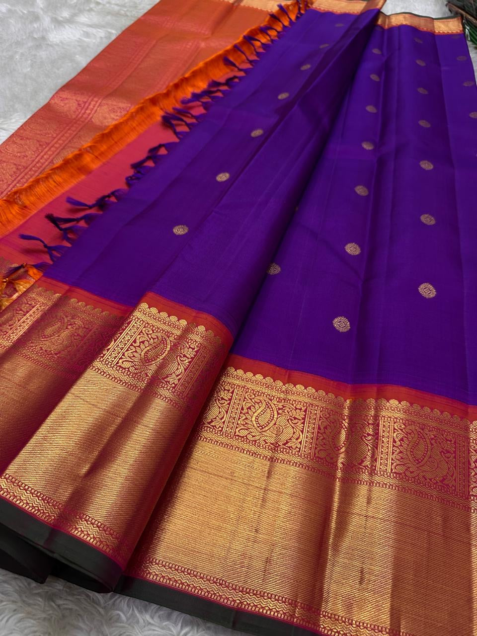 Mayuri -Purple Coral Pure Silk Kanchipuram Saree with Kamalam Buttas, Red-Orange Mayil Border & Exquisite Vanasringaram Zari Pallu