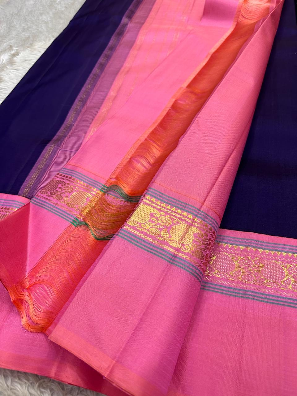 Purple  Pure Kanchipuram Silk Saree with Kaal Erangina pink Zari Border