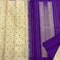 Paal Vadamalli Chakram – Pure Kanchipuram Silk Saree

Ivory body with royal-purple floral coin thread buttas

Grand purple pallu with zari panels & striped center

Handloom Double Warp Weave | Silk Mark Certified | Fall & Pico Done

Free shipping