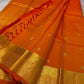 Agnika – orange Kanchipuram Silk Saree with Mayil Chakram Butta & Orange Border Fiery and regal, Agnika is a pure Kanchipuram silk saree featuring a rich red body adorned with intricate Mayil Chakram buttas.