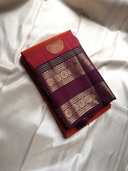 Ishwaryam 🍂🧡✨
Orange Rust Handwoven Kanchipuram Silk Saree with Majestic Gandaberunda Zari Adai Motif 🕊️🌟
Ornate Rettapet Border with Delicate Kamalam Seer Floral Detailing 🌺🪡
Deep Coffee Brown Pallu Adding Warmth and Elegant Contrast ☕🌿