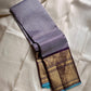 Vadamalli Lilac Kattam — Kanchipuram Pure Silk


Plum (Vadamalli) body • Rich gold zari diamond-jaal pallu

Royal mango–paisley borders with teal selvedge piping

Silk Mark Certified ✅  Free Shipping within USA ✅

Ships in Two Weeks | Dispatch in 1 W