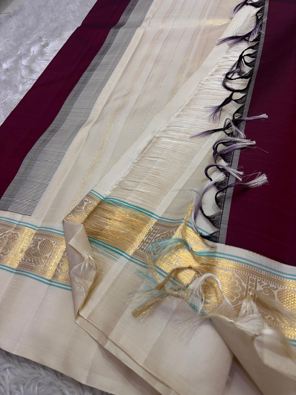 Maroon  Pure Kanchipuram Silk Saree with Kaal Erangina ivory  Zari Border
