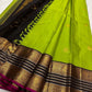 Kili Pachai — Pure Silk Kanchipuram Saree
Parrot-Green Body with Gold Buttas ✨
Black Korvai Borders with Peacock Medallions 🦚
Black Brocade Pallu • Contrast Black Blouse with Zari 🌸
Silk Mark Certified • Free Shipping within USA • Ships in Two Weeks