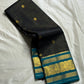 Karuppu Pakshi Kattam – Pure Korvai Kanchipuram Silk Saree
Charcoal black podi kattam body with coin-gold buttas
Peacock-teal korvai border & pallu with pakshi medallion zari
Silk Mark Certified | Blouse Piece Included | Fall & Pico Done
Free Shipping