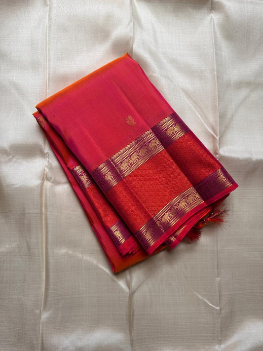 Suryarekha – Pure Korvai Kanchipuram Silk Saree
Kesari-Orange & Pink dual-tone body with gold paisley buttas
Arakku Red korvai border with diamond brocade elephant  motifs
Vadamalli Purple grand zari brocade pallu | shios in 2 weeks ,silk mark cer