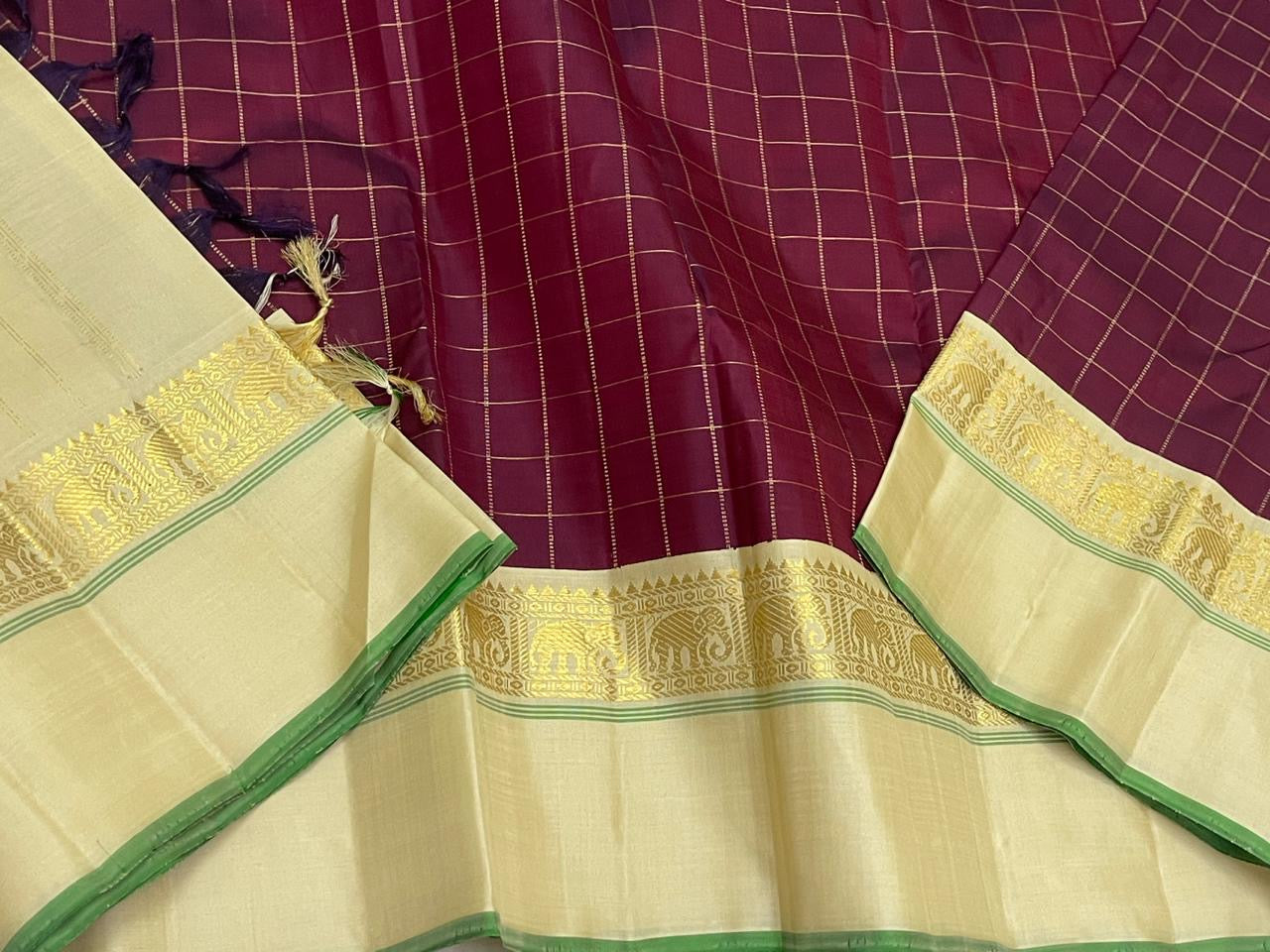 Kanchana Checks — Pure Kanchipuram Silk
Jamuni Gold Grid × Ivory border  with Gaja Zari
Ivory Zari Pallu • Contrast Jamuni Blouse
Silk Mark Certified • Free Shipping within USA
Dispatch in 1 Week • Ships in Two Weeks
