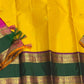 Amrita Pallavi — Kanchipuram Pure Silk

Marigold Yellow Body with Gold Zari Buttas ✨

Deep Bottle-Green Korvai Borders with Paisley Zari & Violet Selvedge

Regal Purple Pallu with Diamond Jaal and Leaf Columns 🌸

Silk Mark Certified | Free USA Shipping |